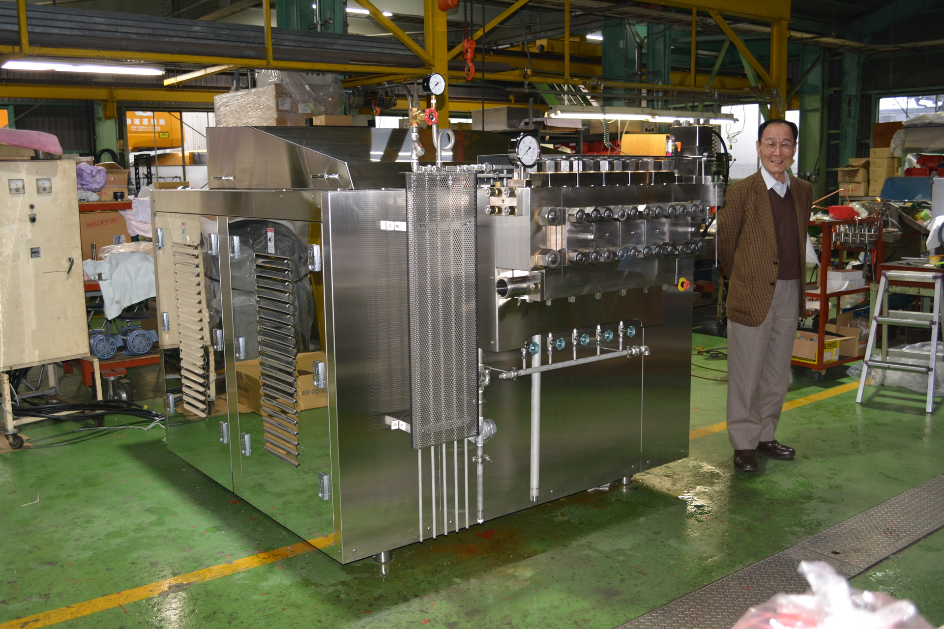 三丸機械工業　スライド